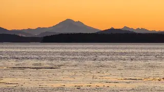 Mount Baker at sunrise across the water from Beachcomber RV Park