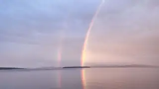 Rainbow over the shoreline at Beachcomber RV Park
