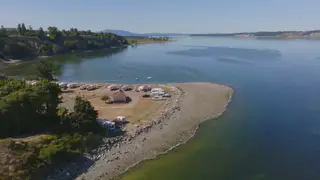 Wide aerial view of Beachcomber RV Park and the surrounding bay