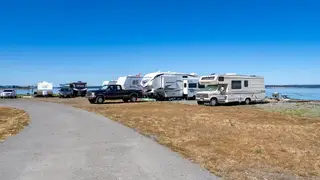 Waterfront RV sites and access road at Beachcomber RV Park