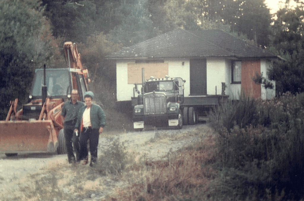 Chew Excavating employees part way down the driveway