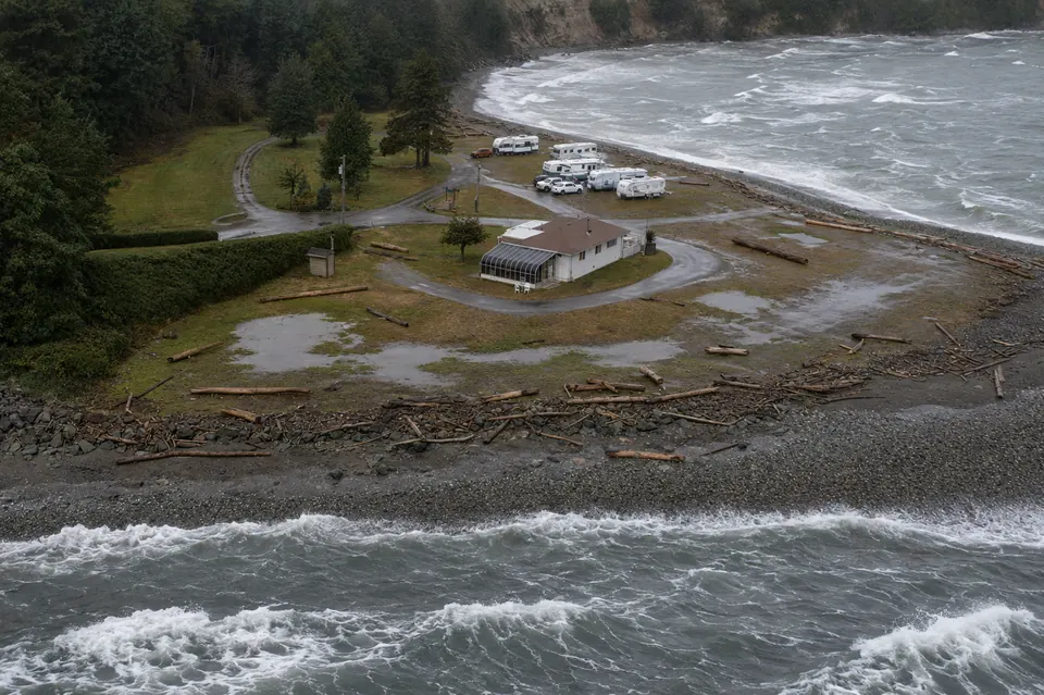Illustrative aerial view of wind-driven winter waves around Beachcomber RV Park at Cowichan Head